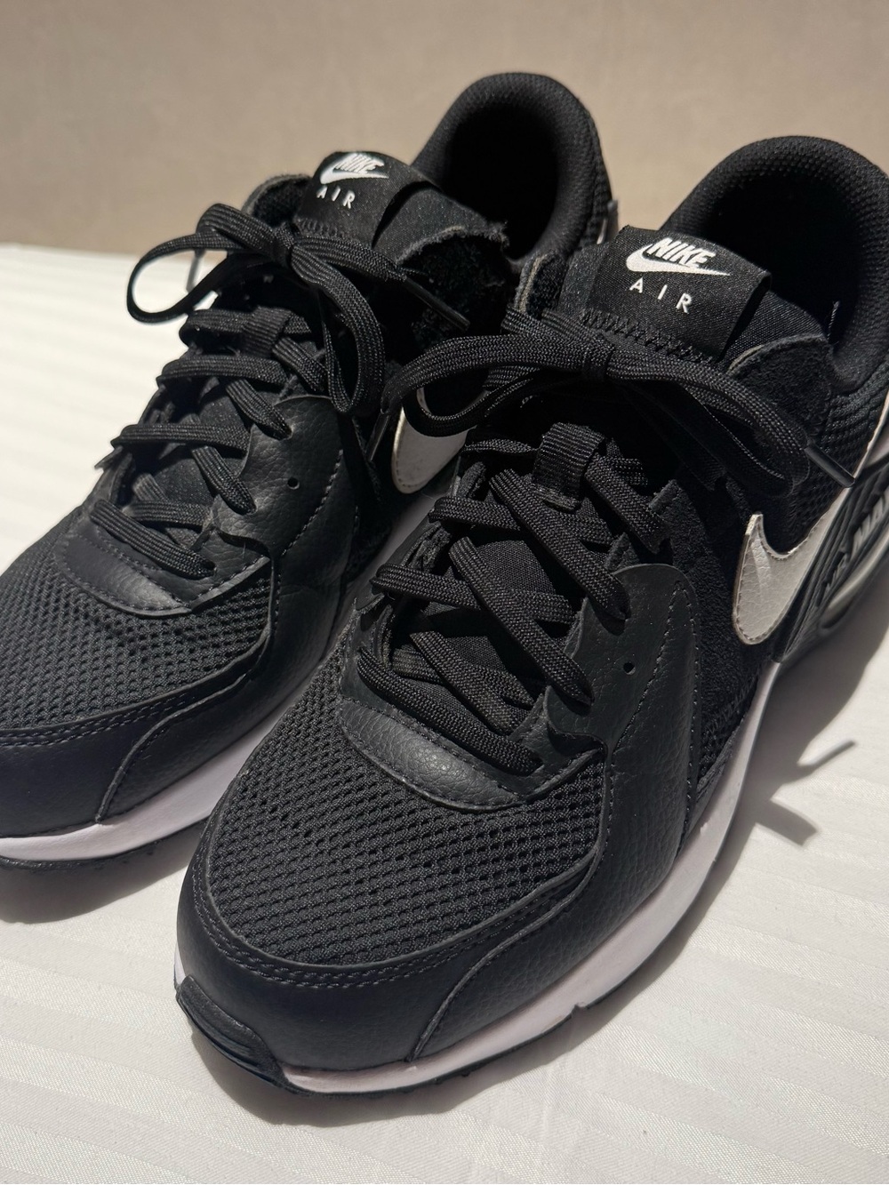 Nike Air Women’s Black Sneakers with White Swoosh